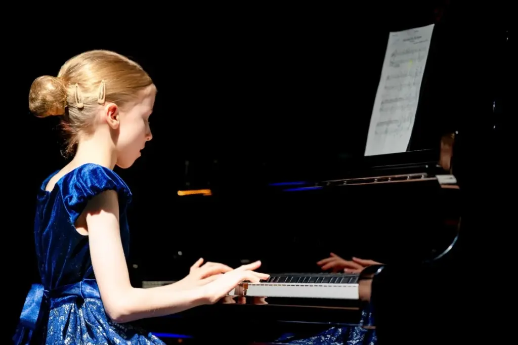 Piano student performing during a MiFa Music School recital