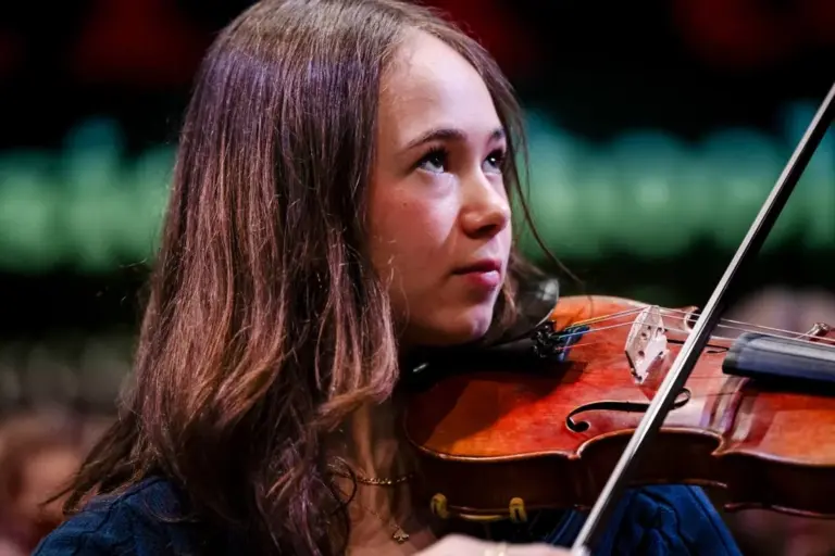 Violinist performing at a MiFa Music School recital